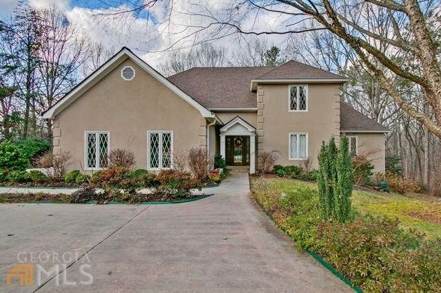 Beautiful set back with circular driveway. Home ha