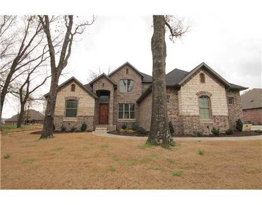 Exterior Front. Rock and stone exterior home sitti