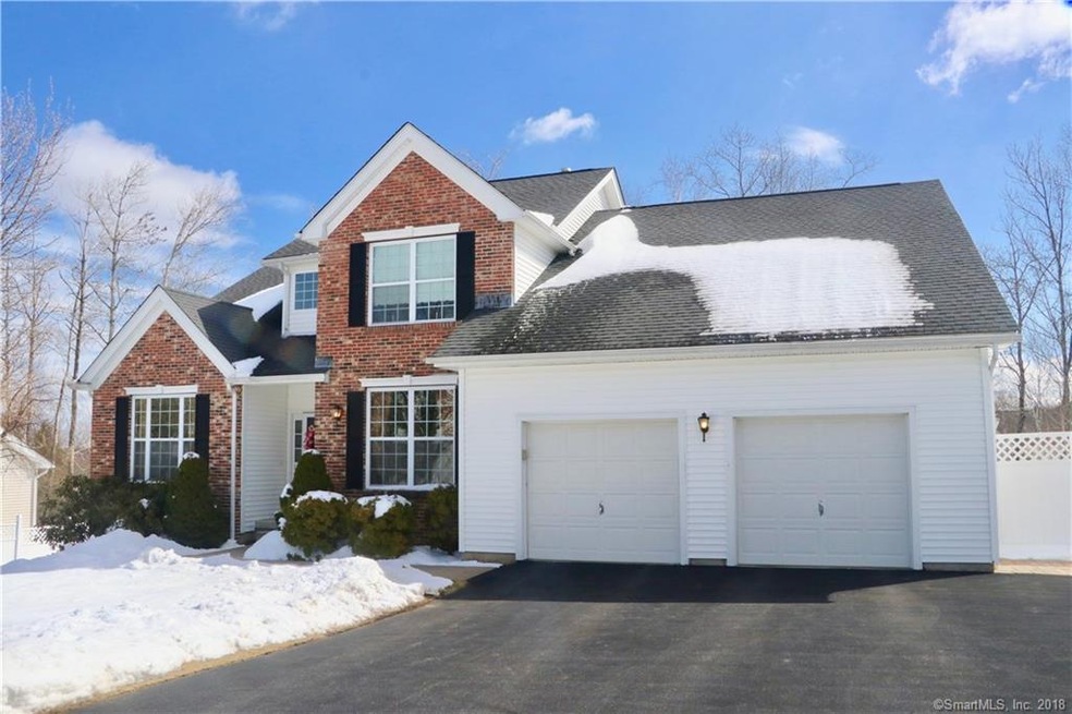 Brick and vinyl exterior, covered entryway