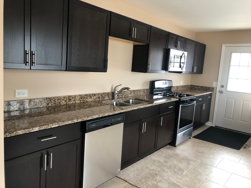 71 Sparrow Rd, Carpentersville, IL 60110 - photo 1