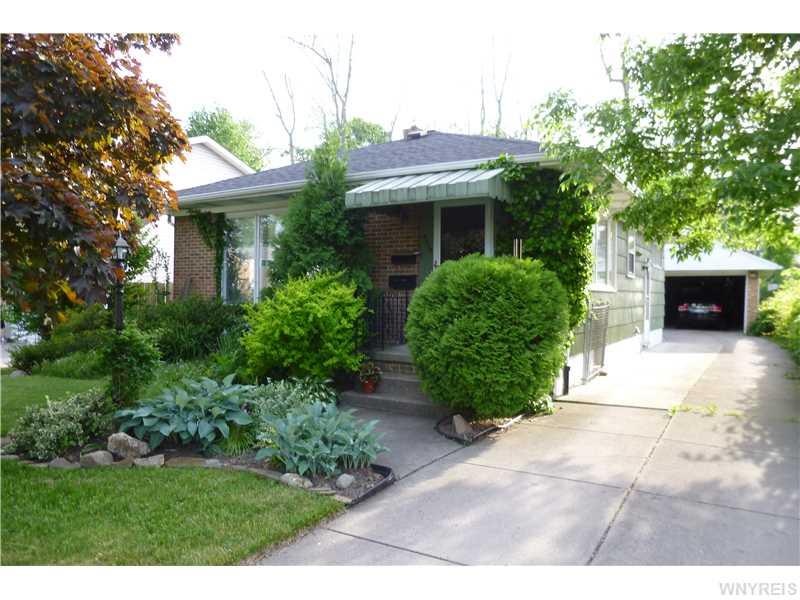 Exterior Front. Charming ranch with brick front an