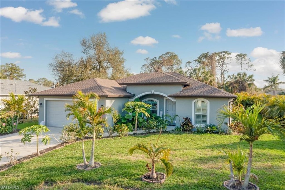 View of front of property featuring a garage and a