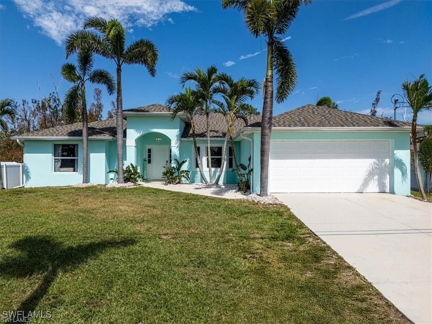 View of front of house with an attached garage, st
