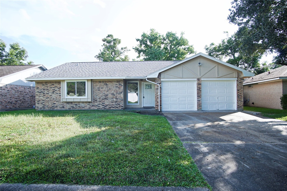 10319 Misty River Dr, Houston, TX 77086 - photo 1