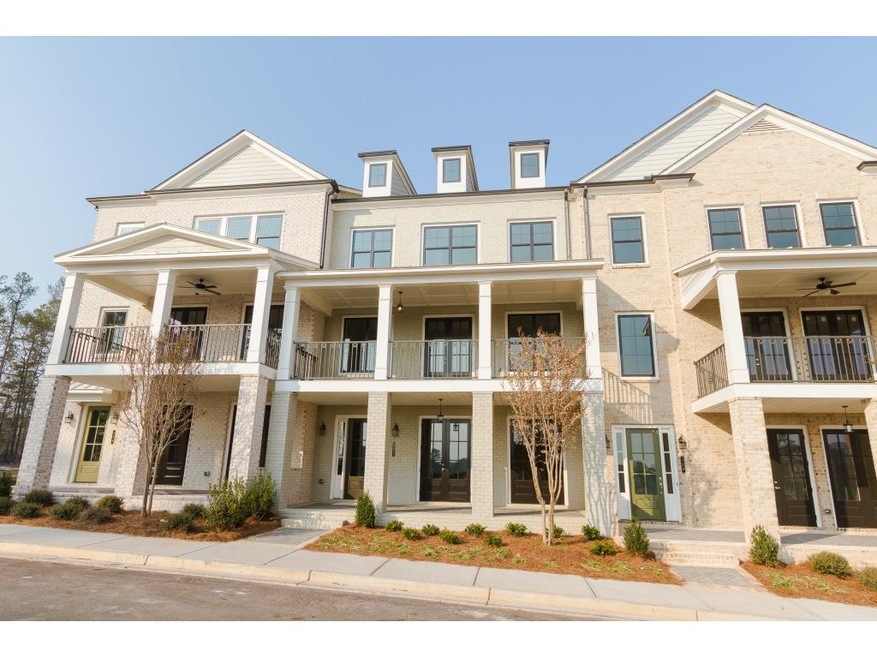 Homesite 11 is a brick interior unit with 2 outdoo