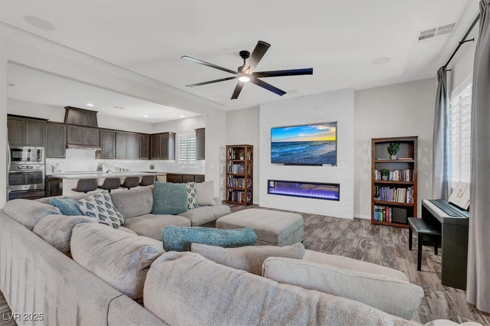 Great room open to kitchen and dining area, custom