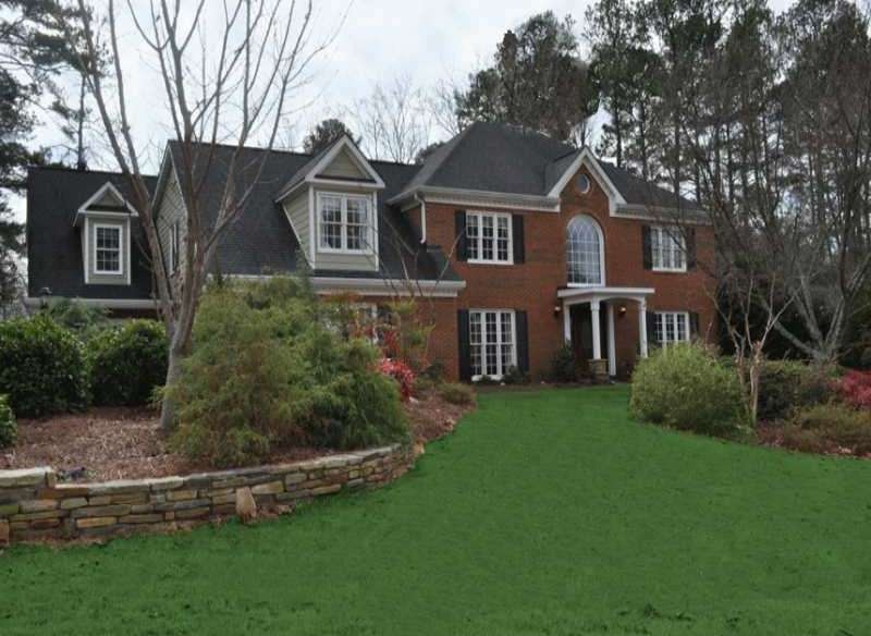 Exterior Front. Luxurious front yard.  Home is loc