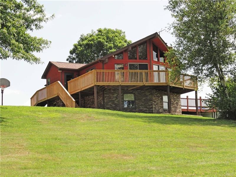 Attractive brick and cedar ranch on 2.47 acres
