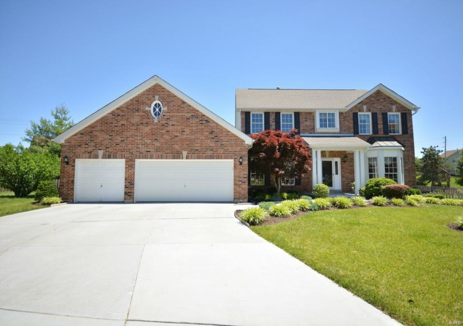 Wow! Gorgeous brick front elevation with copper pa