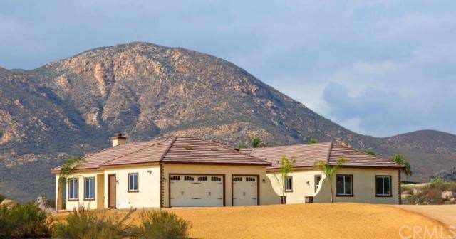Three car garage that is completely finished off i