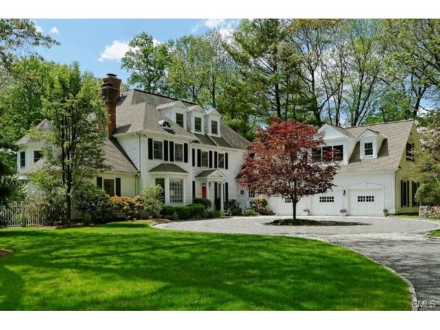 Graceful entrance surrounded by beautifully landsc