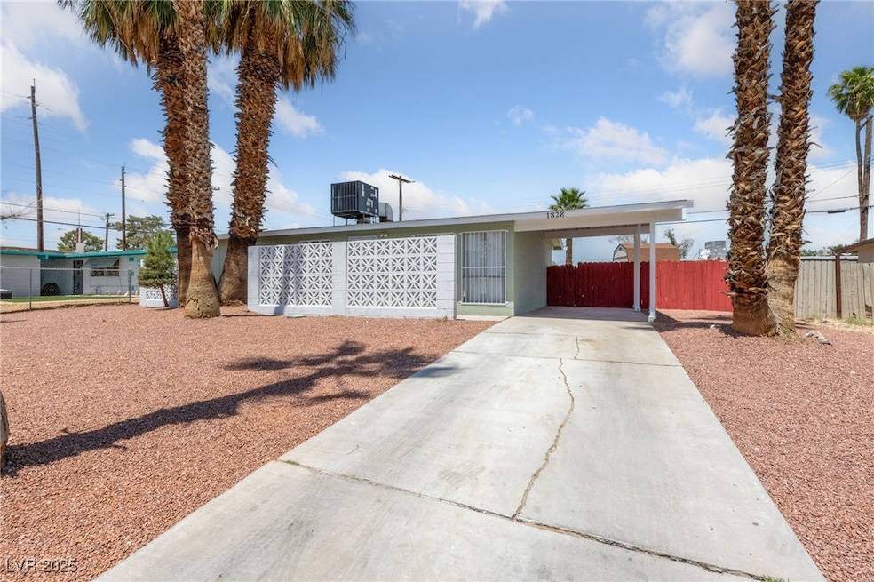 Ranch-style house featuring concrete driveway, a c