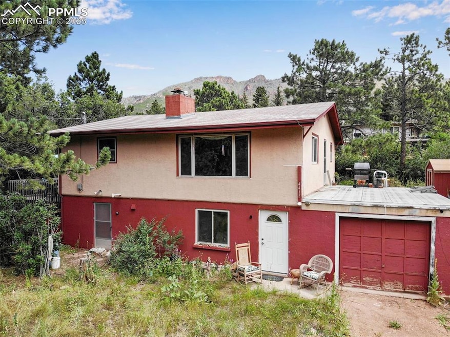 View of front featuring stucco siding and large open windows