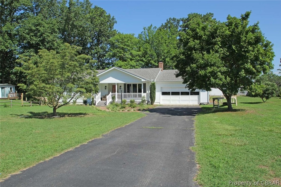 View of the Front of Home with a Nice Paved Drivew