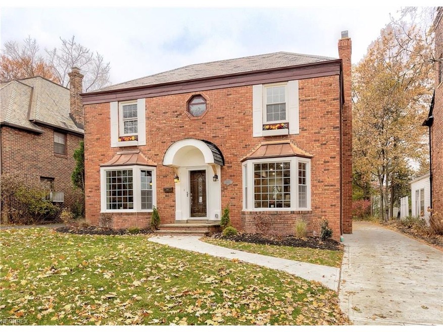 A super handsome, solid brick University Heights h