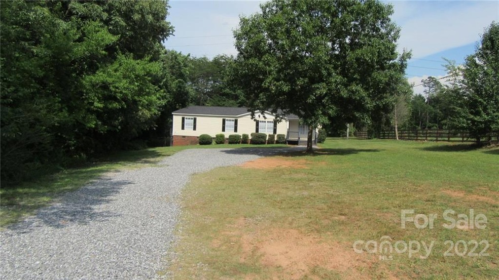 127 Lamb Rd. Statsville, NC 28677. .88 acre lot. Home sits far back off the road for tons of privacy.