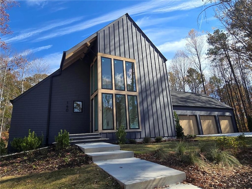 Gorgeous 3 Car Garage with Wall of Windows