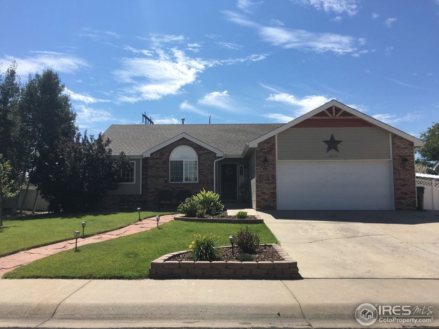 Classic Brick Front with Flagstone pathway