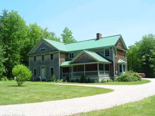 Exterior Front. Enjoy the screened in porch.