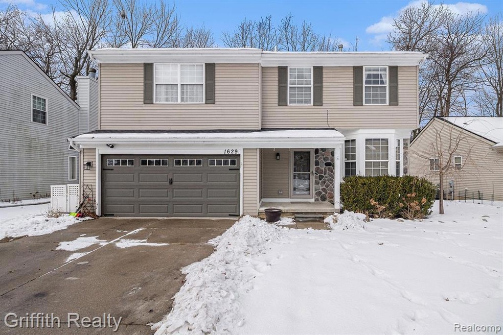 1629 Dartmoor Dr unit 59, Howell, MI 48843 - photo 1