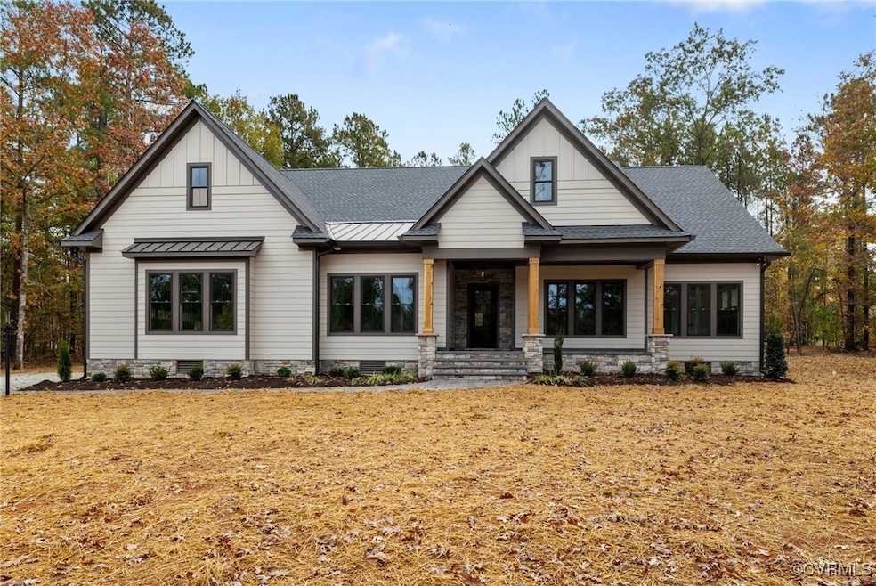 Modern farmhouse featuring a front lawn