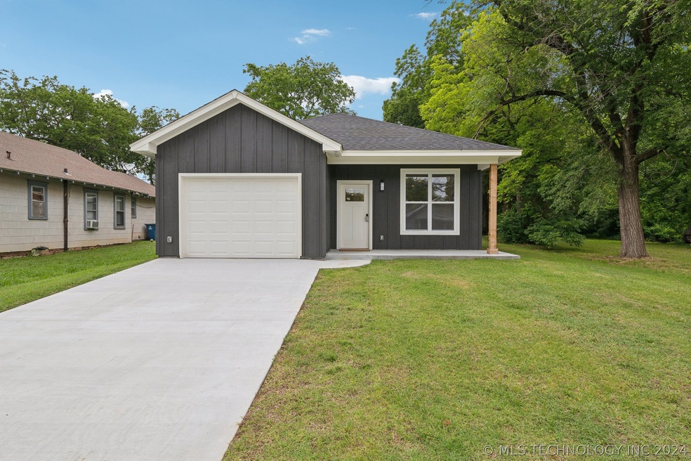 736 E 2nd St, Cushing, OK 74023 - photo 1