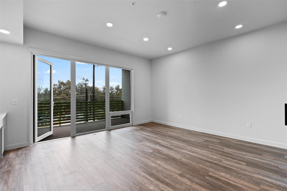 Empty room featuring recessed lighting, wood fini