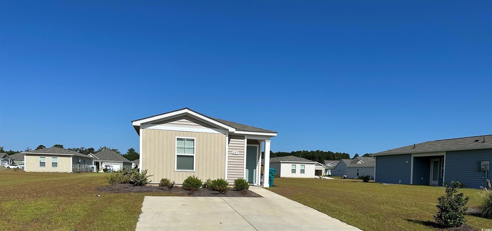 View of front of house with a front yard