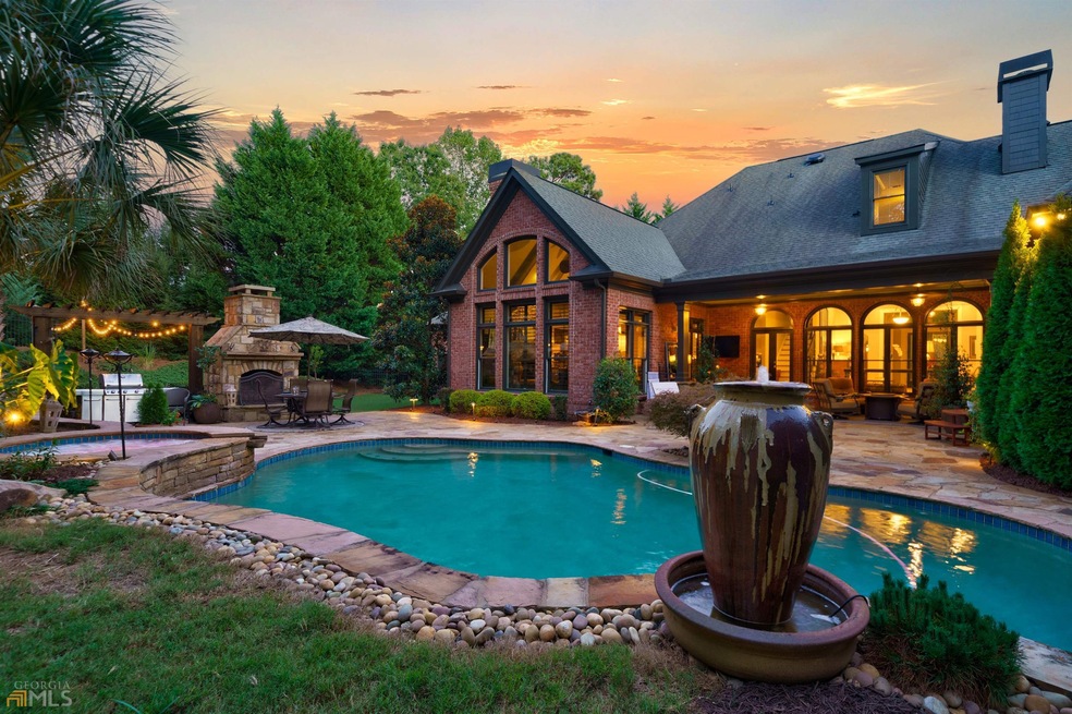 This magnificent custom home in Creekstone Estates