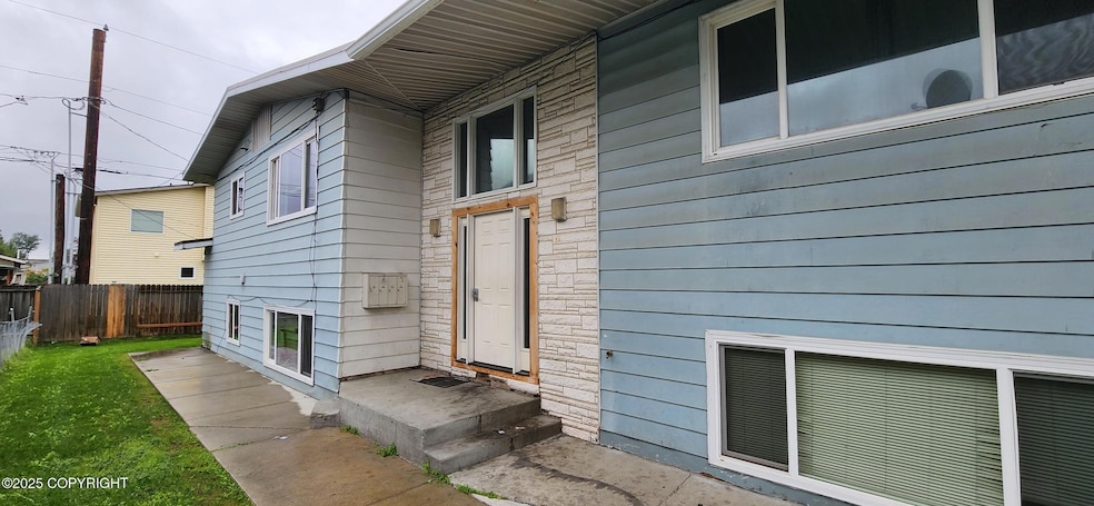 401 Mumford St unit 3, Anchorage, AK 99508 - photo 1