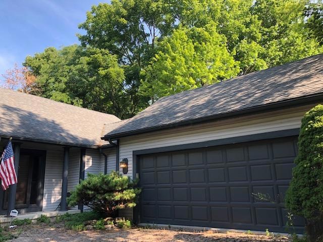 EXTERIOR FRONT OF HOME AND GARAGE