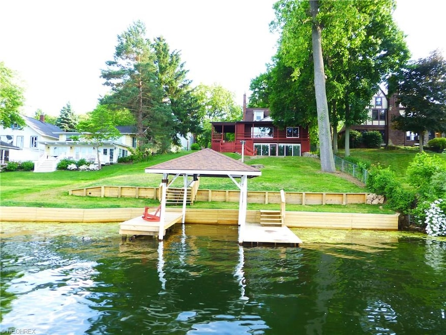 Approaching the front of the house by boat from Ea