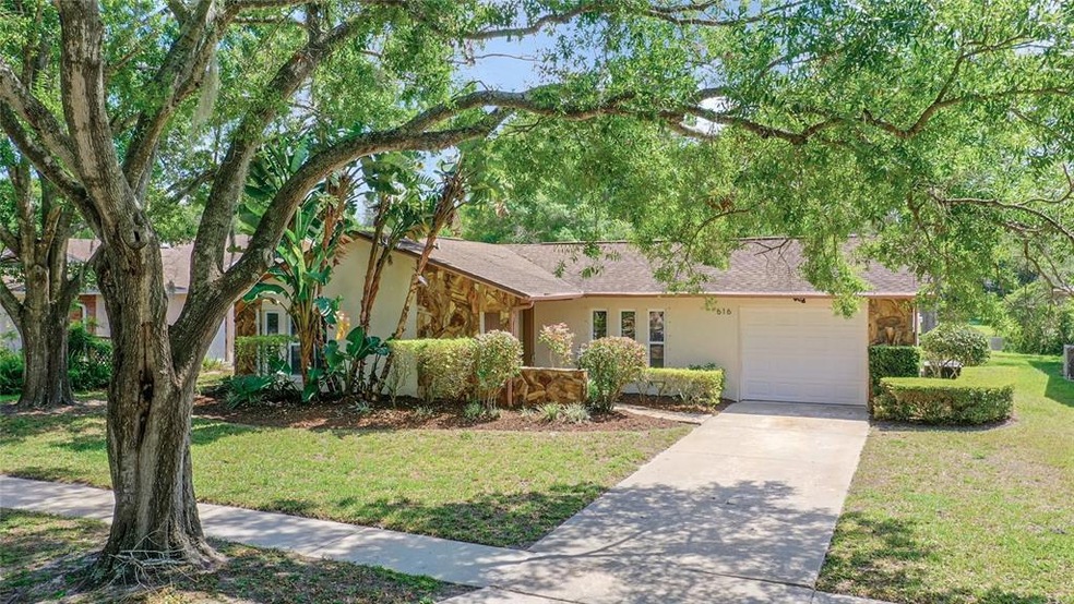 616 Sugar Mill Rd, Tarpon Springs, FL 34689 - photo 1