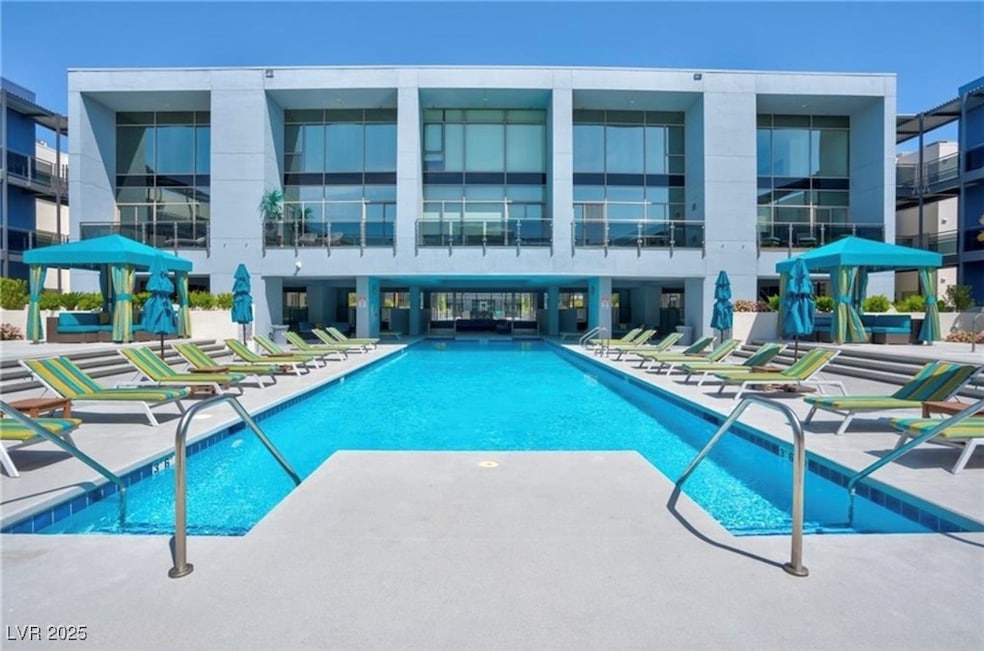 Community pool featuring a gazebo and a patio area
