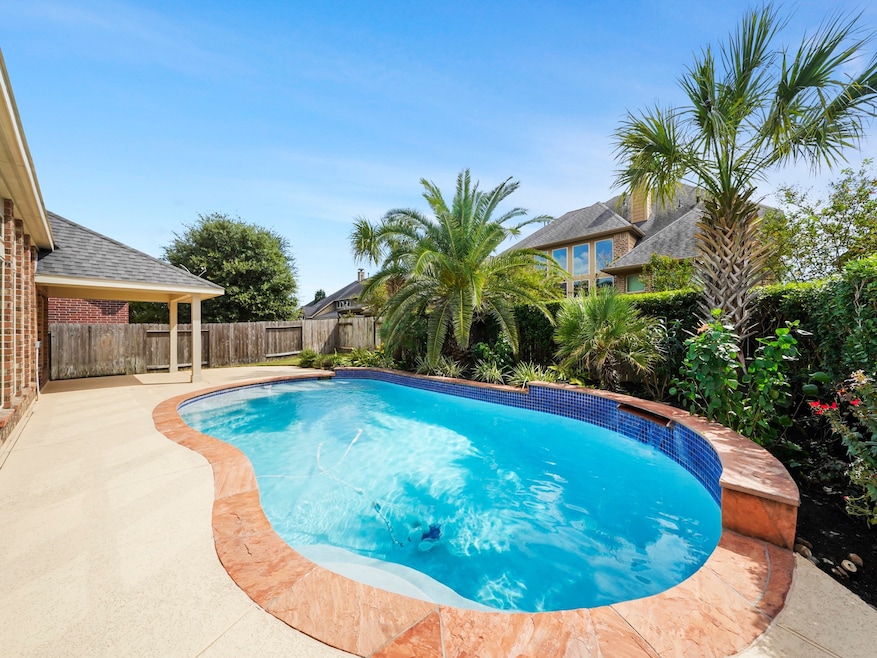 Stunning home in Firethorne community with over 3000 Sq Ft, 4 bedrooms, 3 bathrooms, spacious flex area, study and gorgeous backyard with private pool!