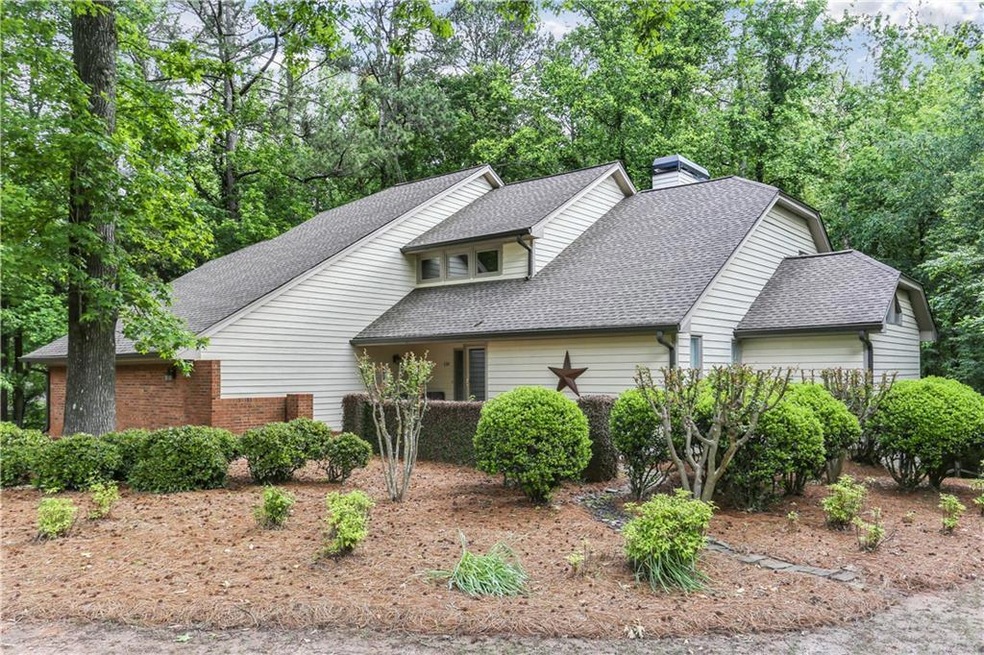 Contemporary cedar home on 1.11 lush acres with cr