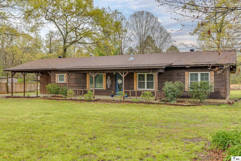 8956 Deblieux Rd, Bastrop, LA 71220 - photo 1