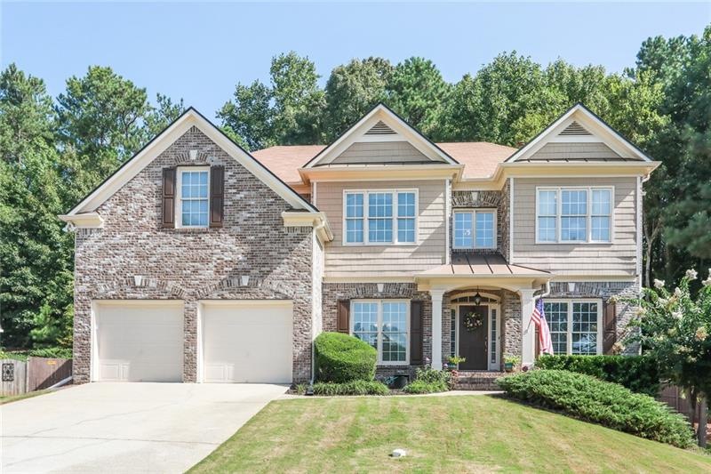 Welcome home to Retreat at Old Vinings Lake!