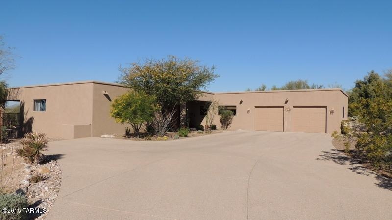 Home with expansive concrete driveway