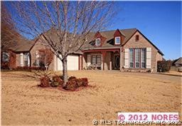 Brick exterior with covered front porch.