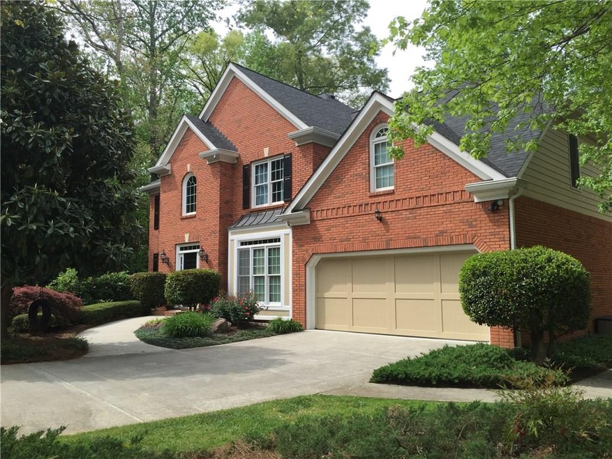 Welcome Home! Three sides brick and flat driveway 