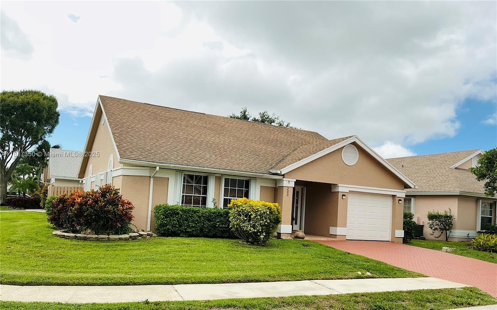 203 Moccasin Trail N, Jupiter, FL 33458 - photo 1