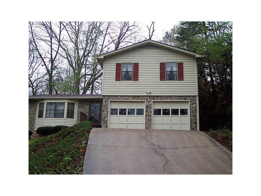 Exterior Front. Stone & maintenance free vinyl