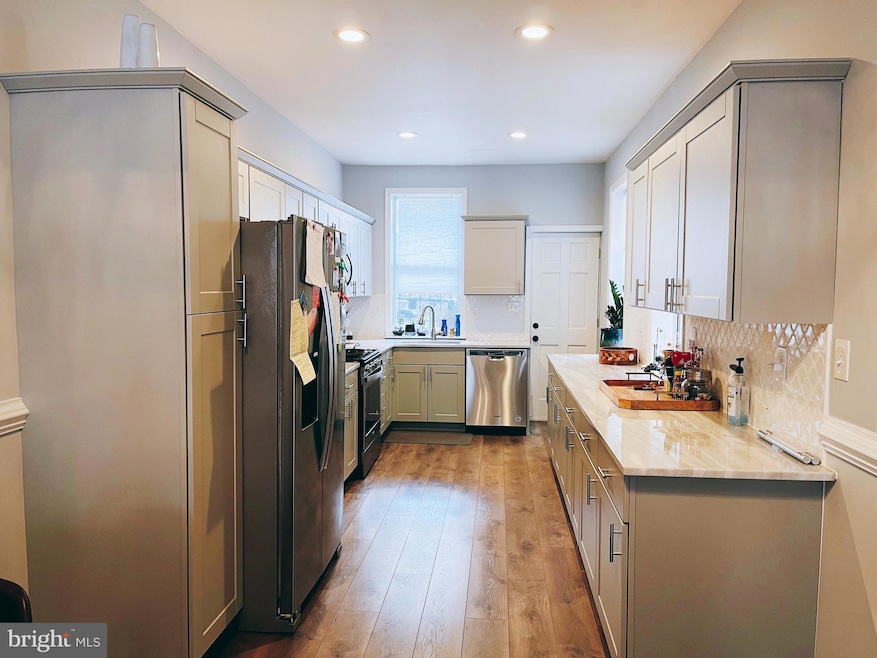 1602 E Biddle St, Baltimore, MD 21213 - photo 1