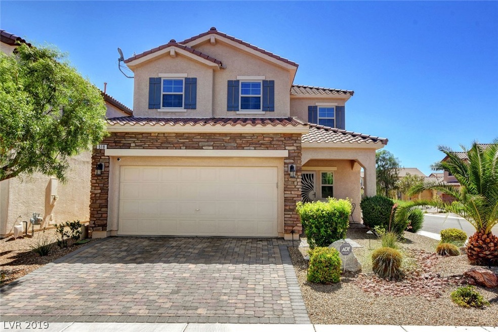 Corner Lot with spacious brick paver driveway.