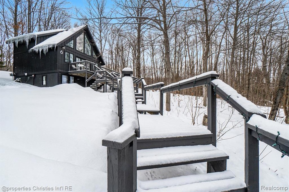 Stairs and walkway up to entrance of the cabin