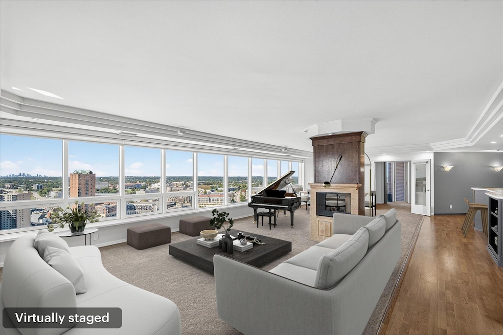 Downtown living at its finest with an open floor plan and wall of windows. All new hardwood flooring and plush carpet.