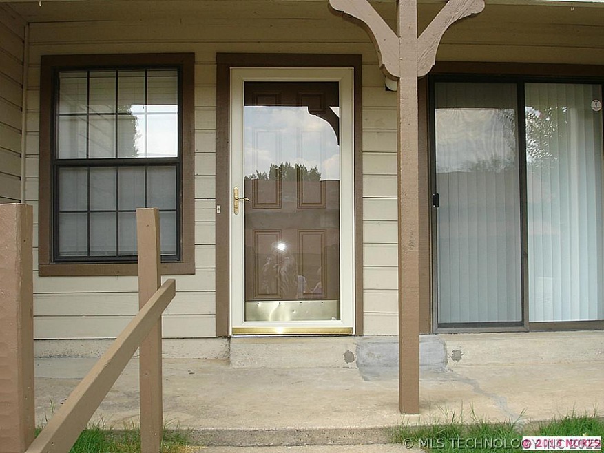 Front of Condo has covered Porch