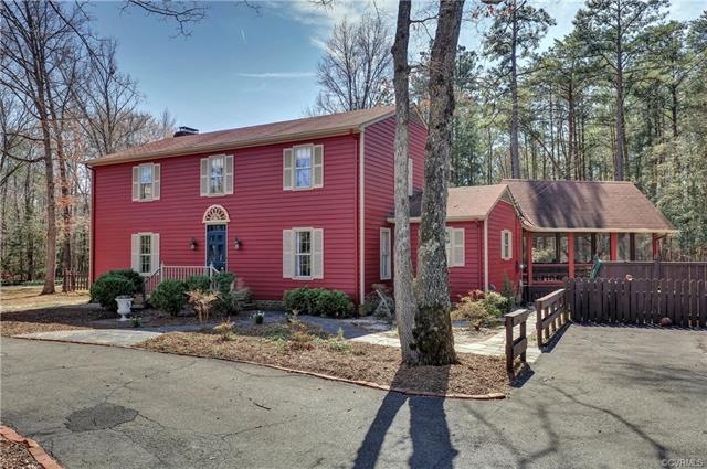 Paved circular driveway with parking on the side a