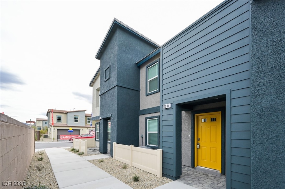 View of side of home featuring stucco siding